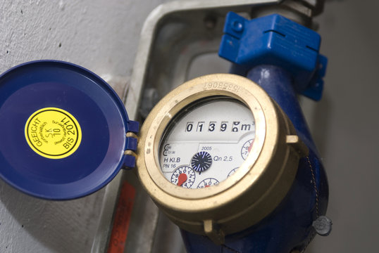 USI field reader taking a reading from an electric meter